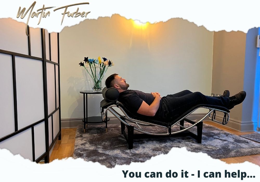 Client relaxing on recliner in main therapy area at Martin Furber private practice Preston